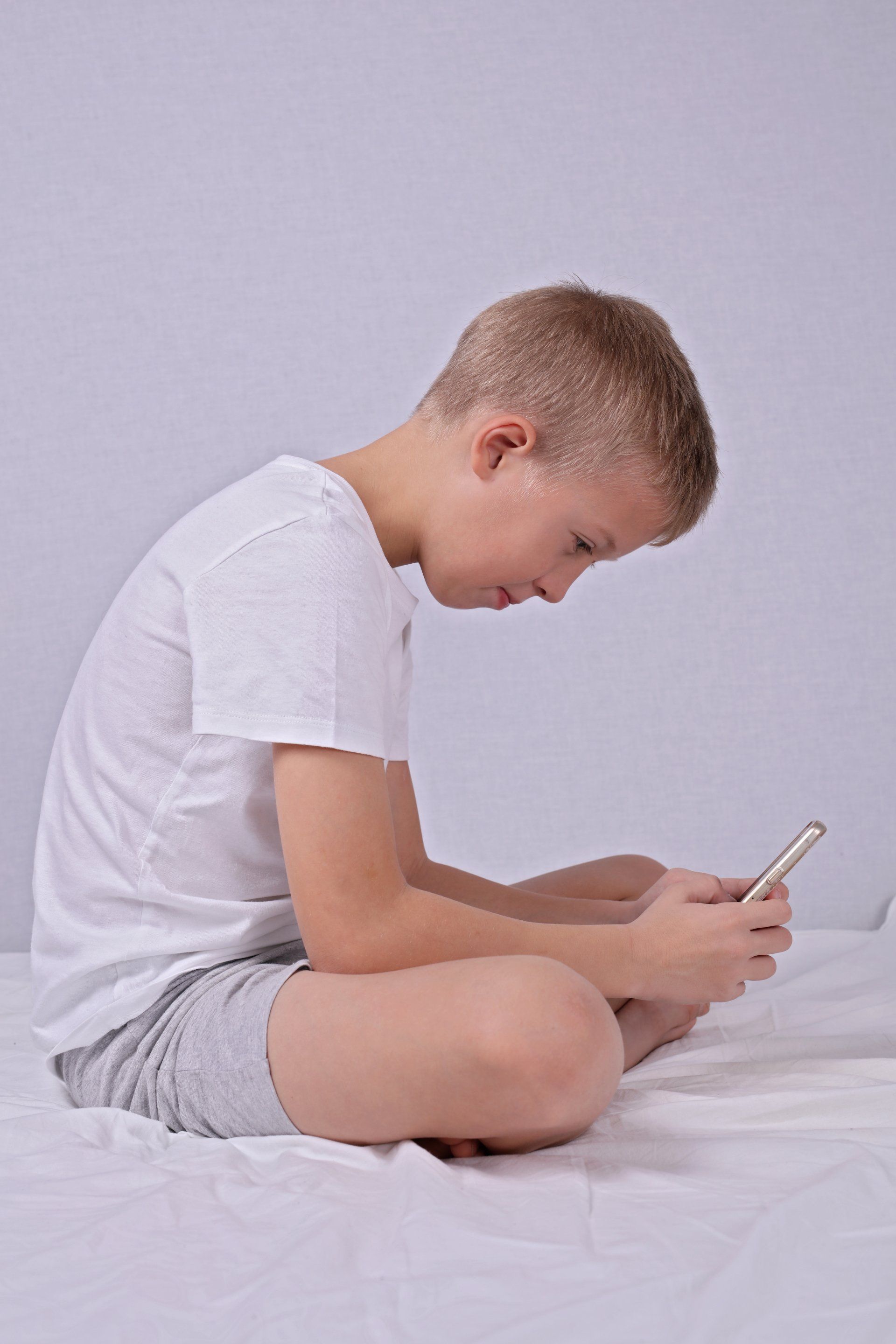 child sitting with poor posture