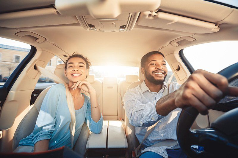 Couple Inside the Car — Greenacres FL — Roy-Roth Agency