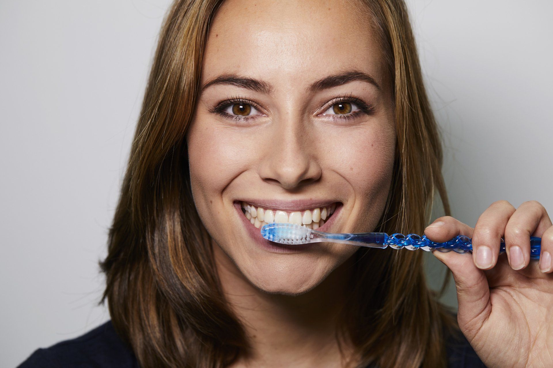 Wisconsin — Girl Cleaning Her Teeth in MILWAUKEE, WI