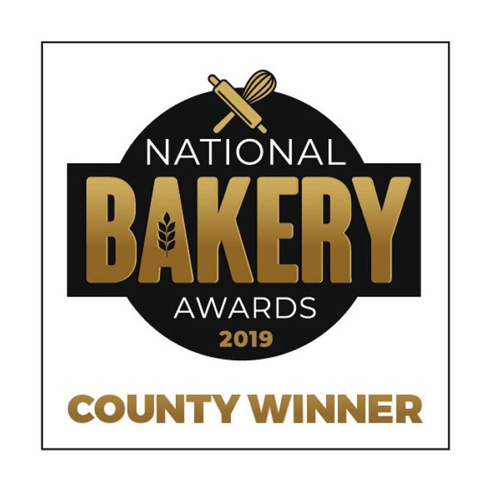 The national bakery awards logo is a county winner.