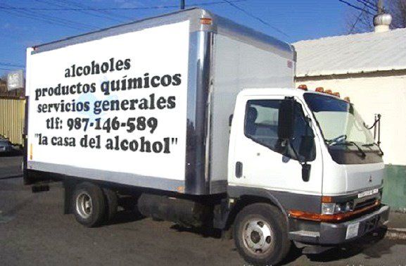 White truck with side text for
