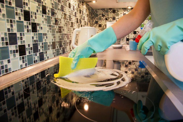 Carpet Cleaning — Using Vacuum on Carpet in Carmel Valley, CA Carpet Cleaning — Using Vacuum on Carpet in Carmel Valley, CA