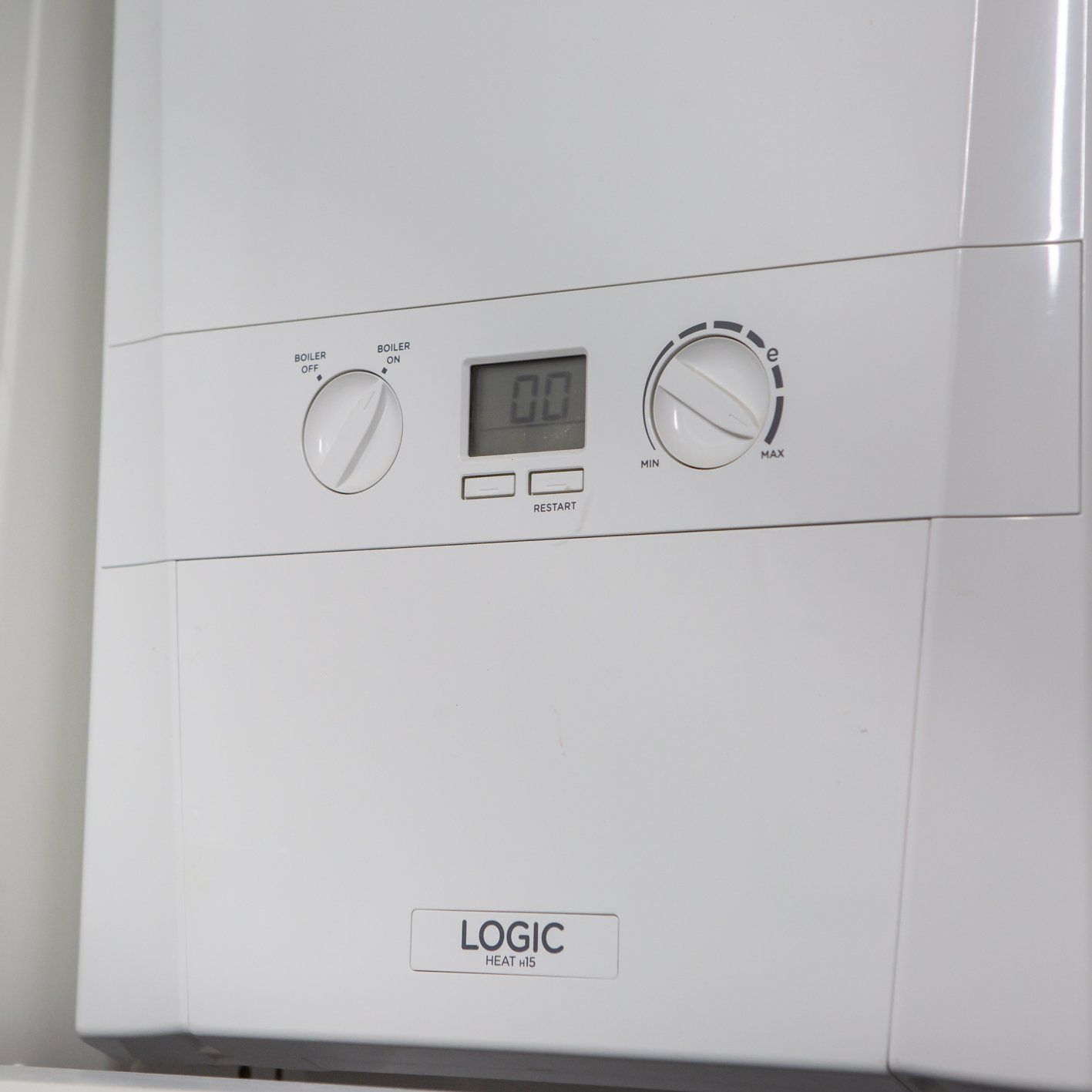 white boiler with pipes