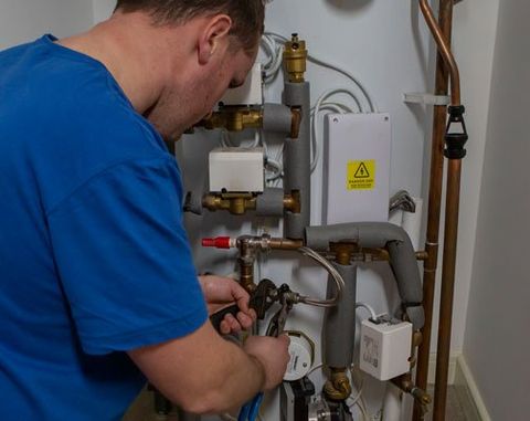 white boiler with pipes