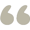 A pair of quote marks on a white background.