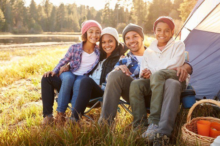 Stock photo of a family enjoying the outdoors in fall