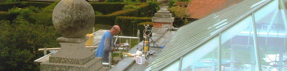 A roofer at work