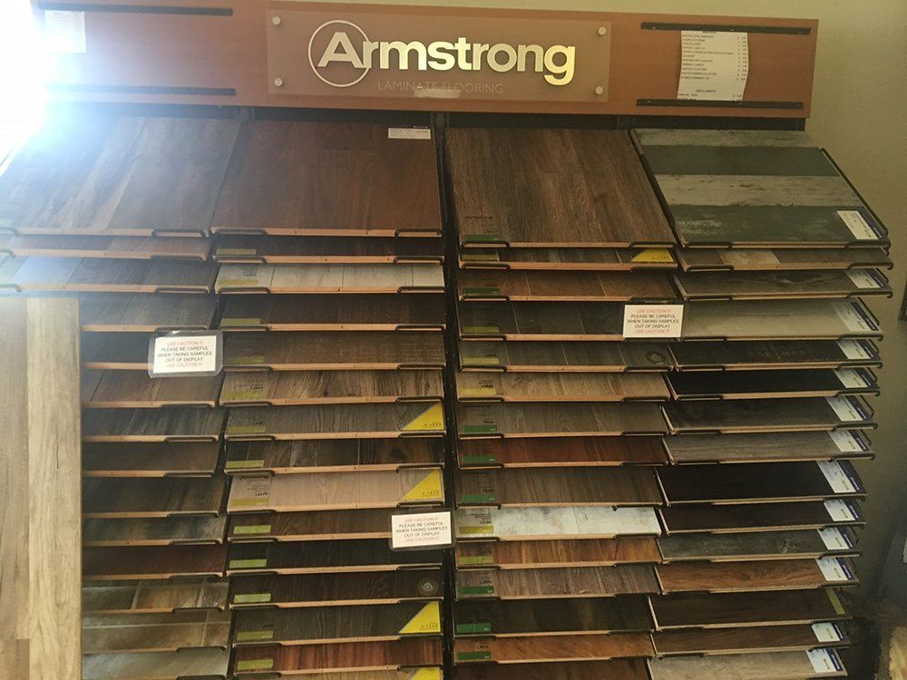 A display of armstrong hardwood flooring in a store