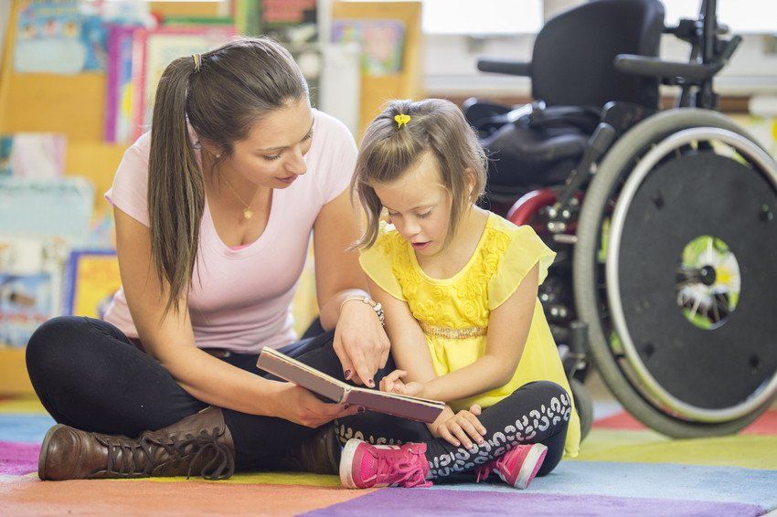 healthcare worker teaching kid