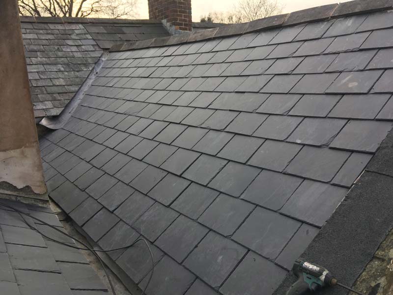 new slate tiles laid on a roof