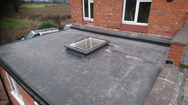installing a Velux window on a flat roof