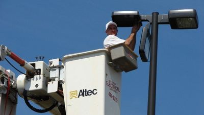 Contractor Repairing Pole Lighting - Commercial Electrical Contractors in Virginia Beach, VA Contractor Repairing Pole Lighting - Commercial Electrical Contractors in Virginia Beach, VA