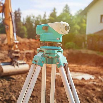 Surveyor Equipment On Construction Site — Sharpsburg, GA — Turner & Associates Land Surveyors, P.C. Surveyor Equipment On Construction Site — Sharpsburg, GA — Turner & Associates Land Surveyors, P.C.