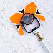 Orange Theodolite Prism — Sharpsburg, GA — Turner & Associates Land Surveyors, P.C. Orange Theodolite Prism — Sharpsburg, GA — Turner & Associates Land Surveyors, P.C.