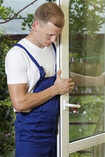 Worker performing a quick installation — Glass Installation in Redondo Beach, CA Worker performing a quick installation — Glass Installation in Redondo Beach, CA