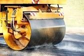 Steamroller paving new road