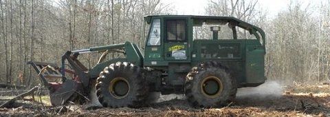 tractor removing brush