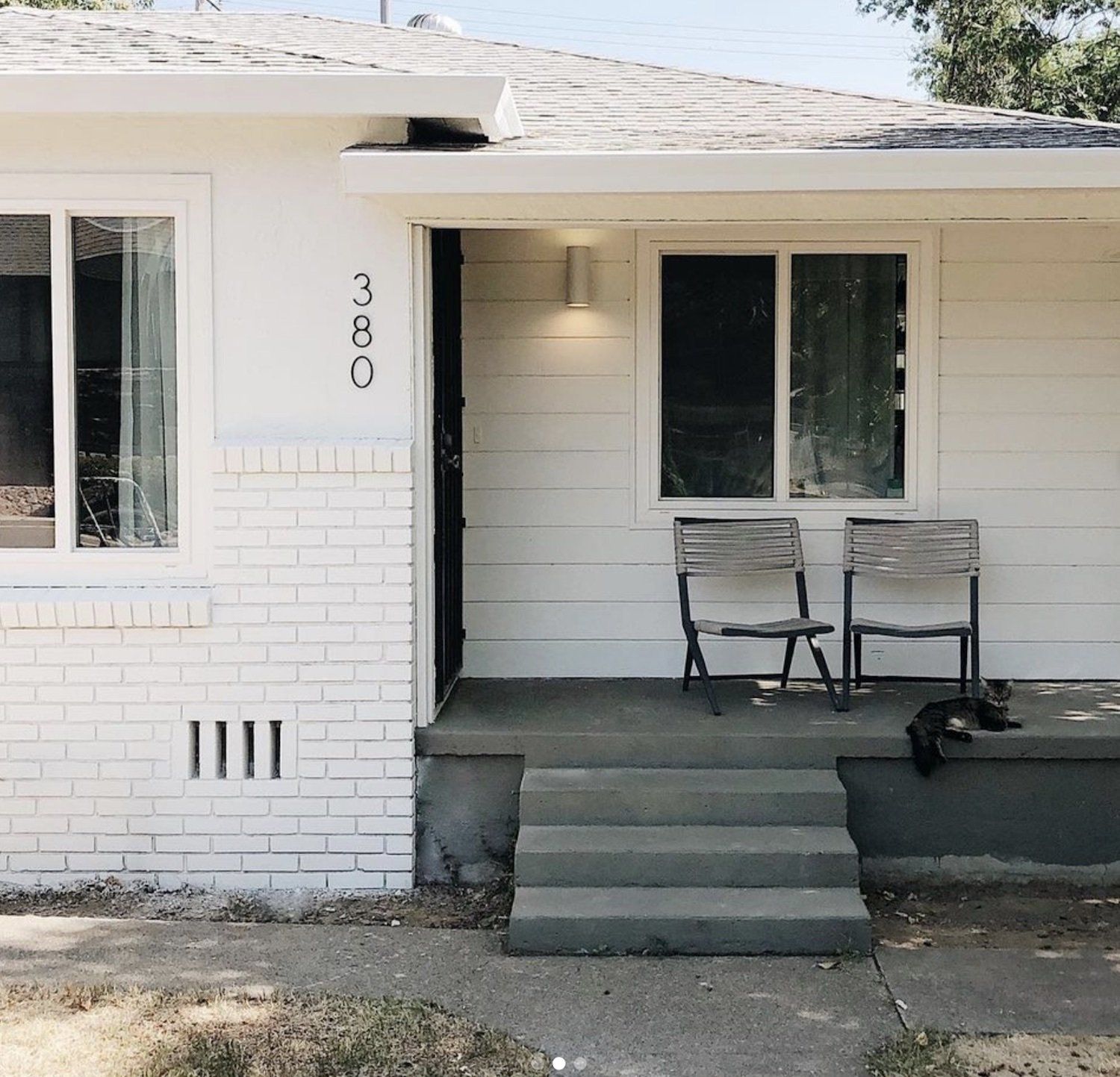 An image of the front of The Mayes Team modern minimalist home.
