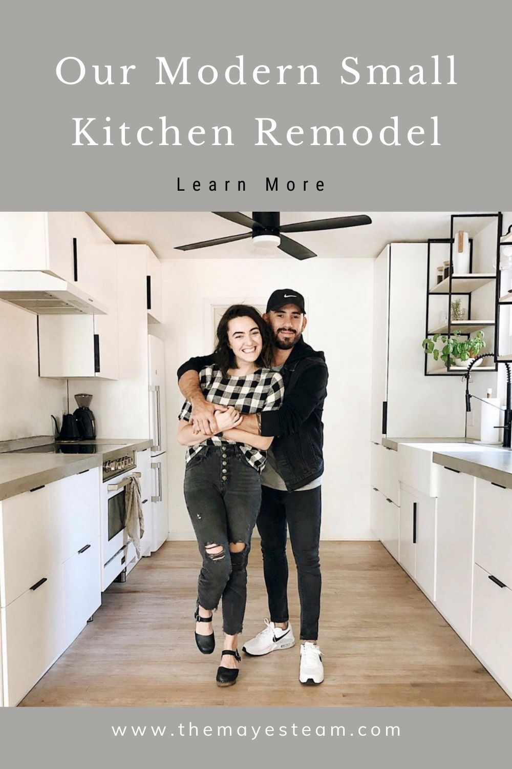 Debbie & Gabriel Mayes embrace in their skoolie kitchen remodel. Image overlaid with text that reads Our Modern Small Kitchen Remodel Learn More.