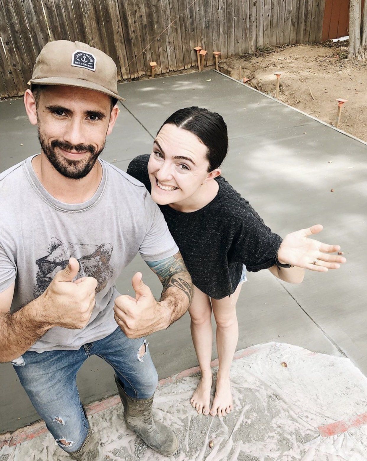 Debbie & Gabriel Mayes smile about renovation on a budget.