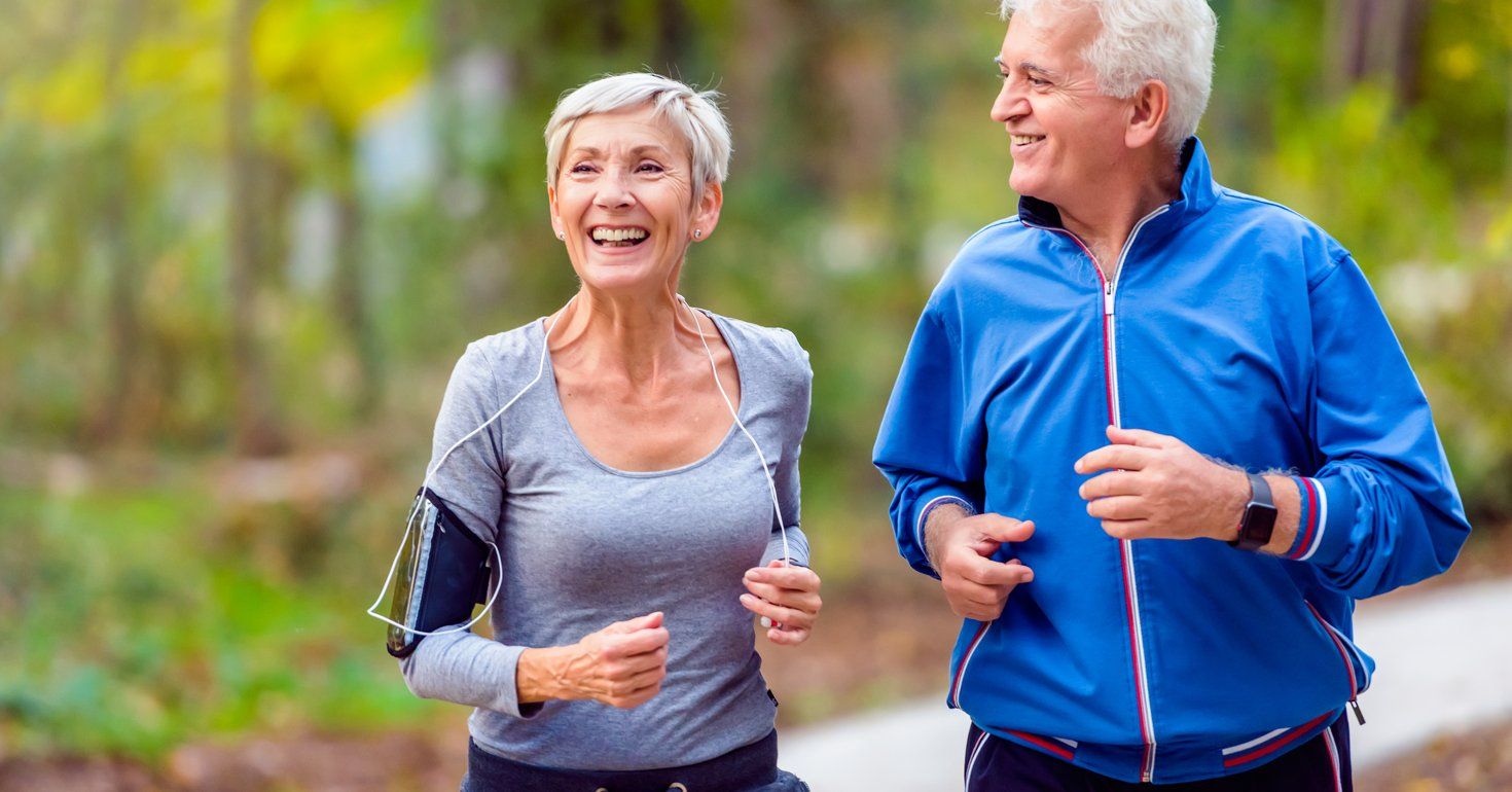 Senior Couple Jogging — Sandy Spring, MD — Brooke Grove Retirement Village Senior Couple Jogging — Sandy Spring, MD — Brooke Grove Retirement Village