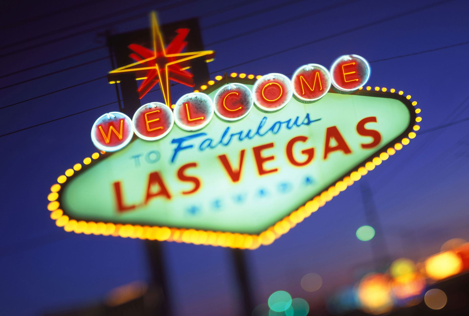 A neon sign that says welcome to fabulous las vegas