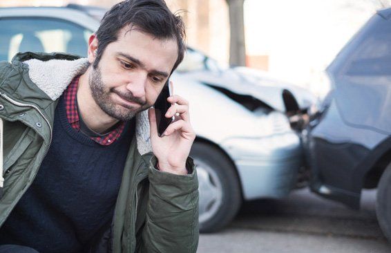 Man Calling First Aid After Car Crash — Accident Case Lawyer in Hopkinsville, KY Man Calling First Aid After Car Crash — Accident Case Lawyer in Hopkinsville, KY