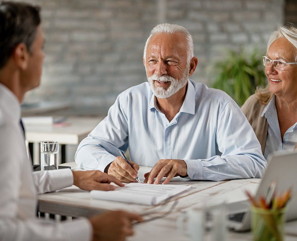 Man Talking To Elder Couple — Tulsa, OK — Your Easy Affordable Insurance Services Man Talking To Elder Couple — Tulsa, OK — Your Easy Affordable Insurance Services