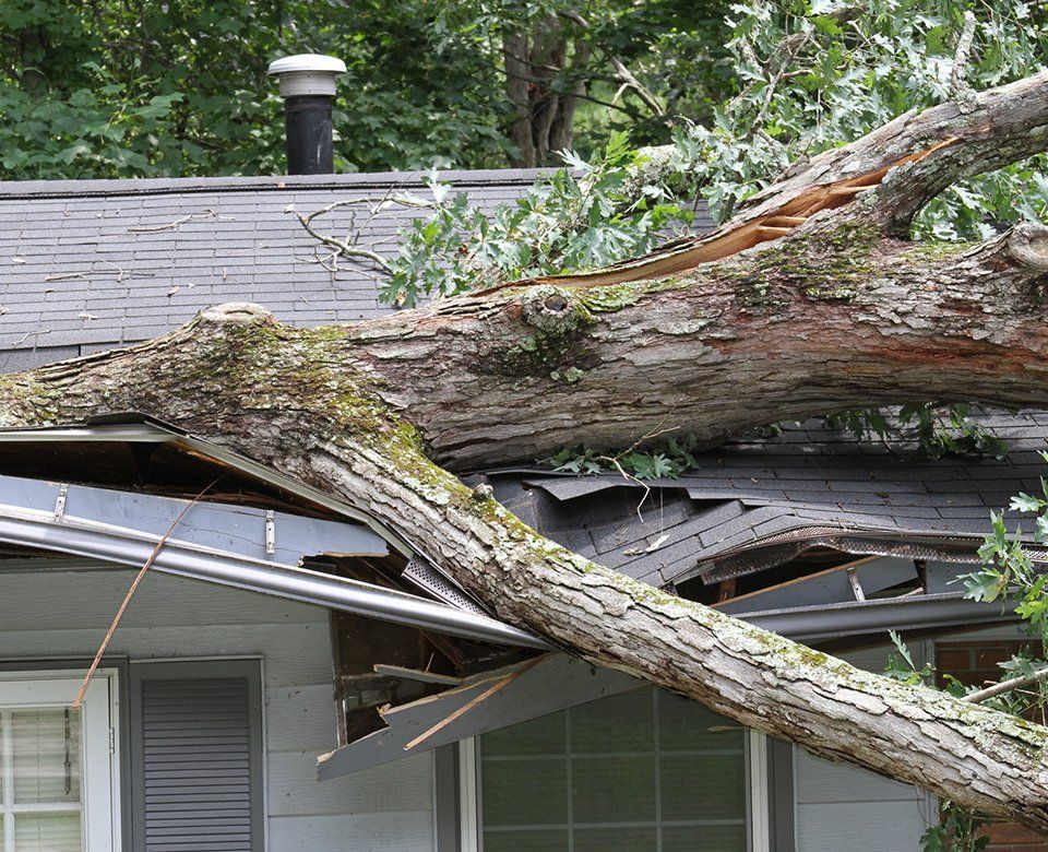 Damaged Residential House Roof — Tulsa, OK — Your Easy Affordable Insurance Services Damaged Residential House Roof — Tulsa, OK — Your Easy Affordable Insurance Services