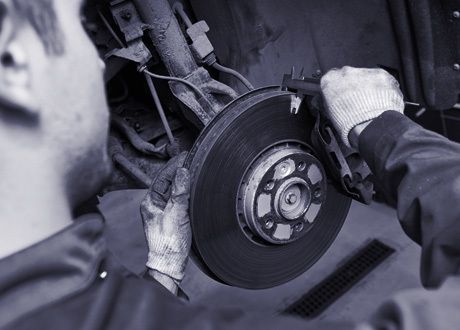 Mechanic working on new breaks