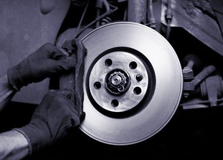 Man working on brake shoes