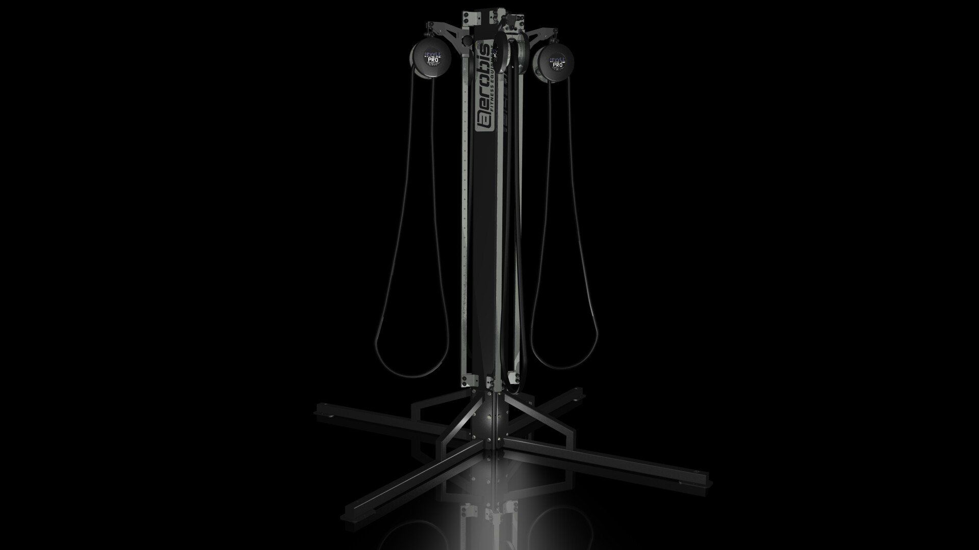 Black gym cable machine with pulleys and ropes on a dark background, centered on a reflective floor.
