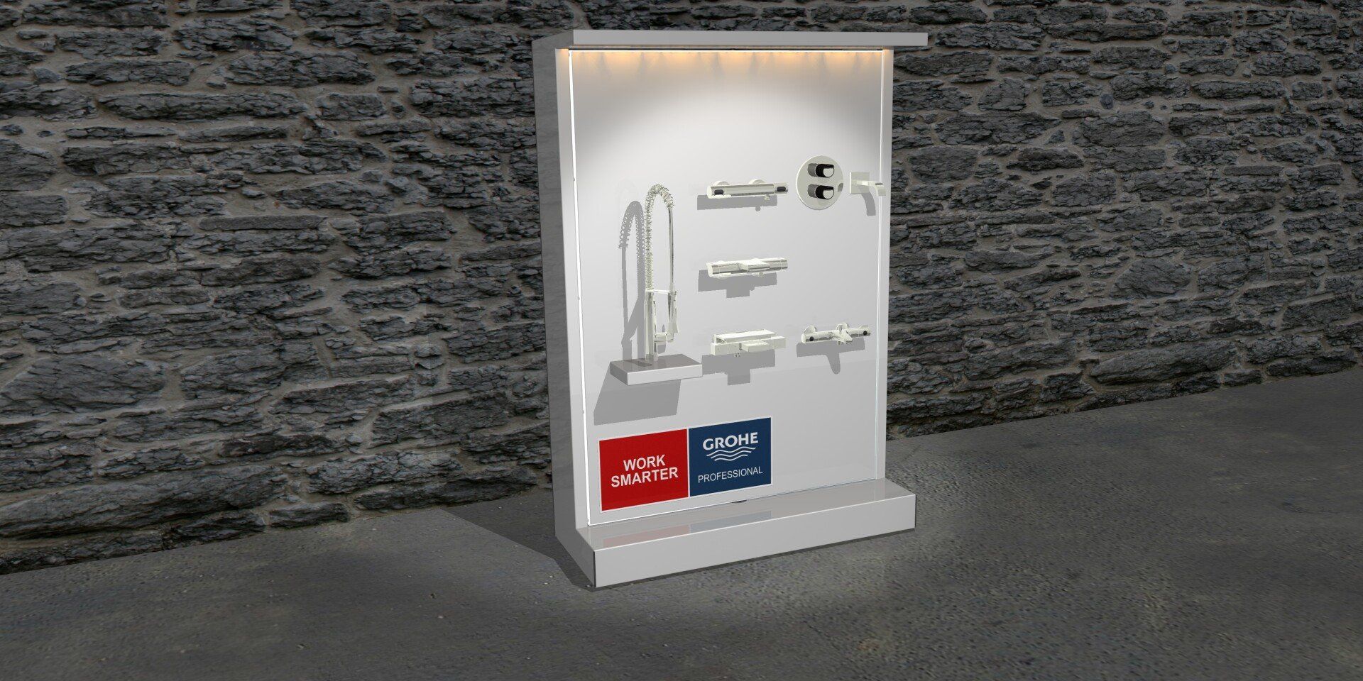 Illuminated museum display case with sketches and small objects against a stone wall.