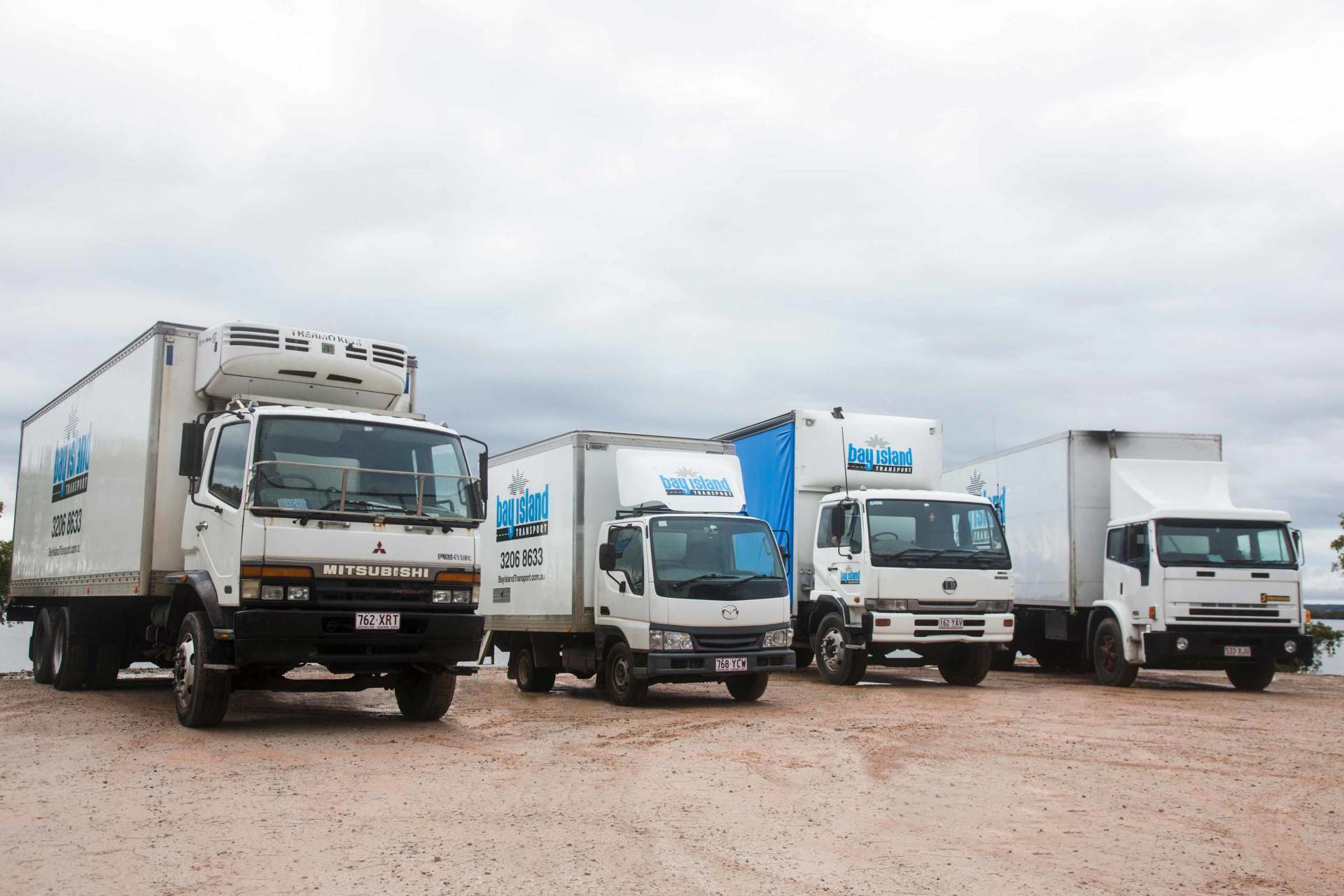 4 trucks side view