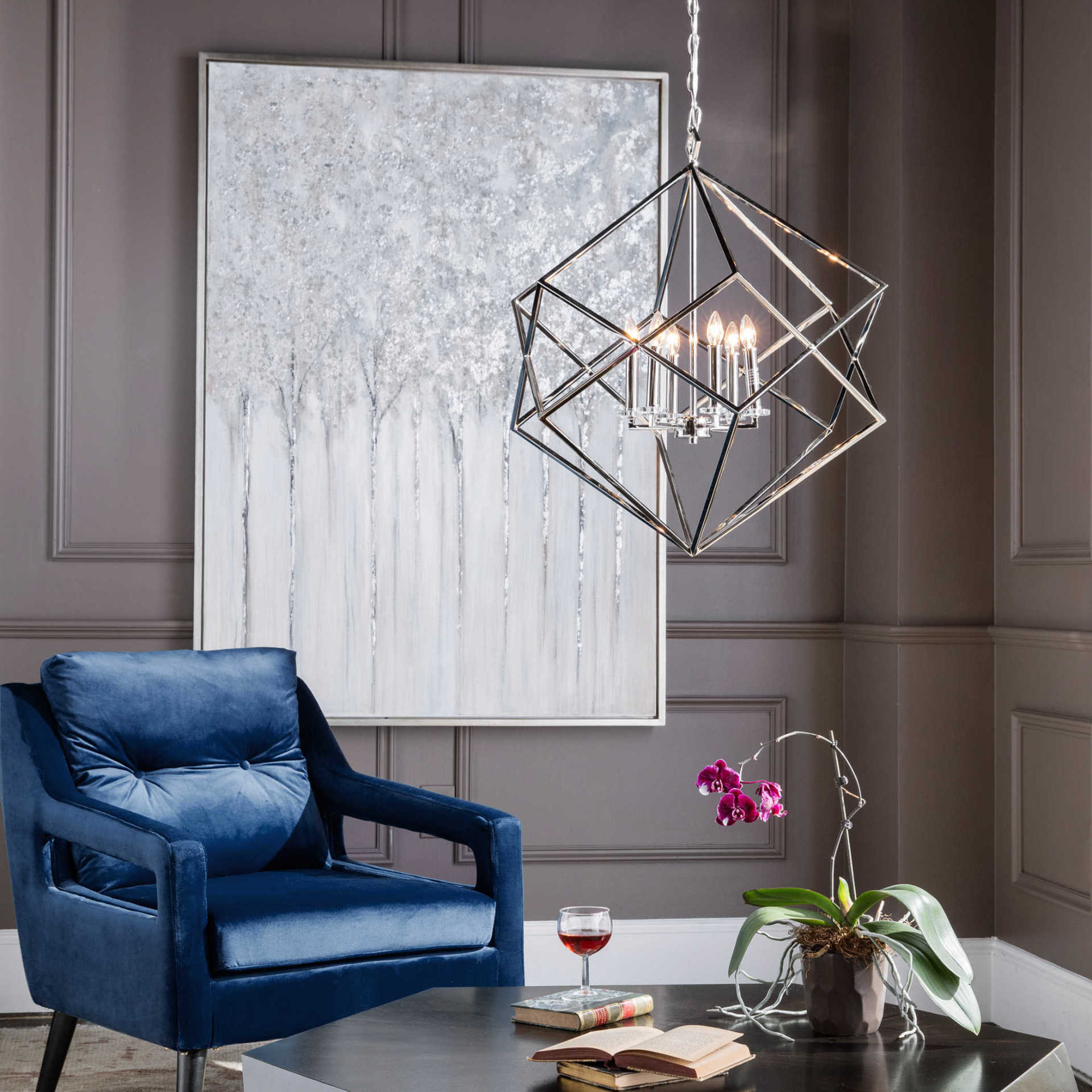 Large Metallic Chandelier Hung Above Coffee Table