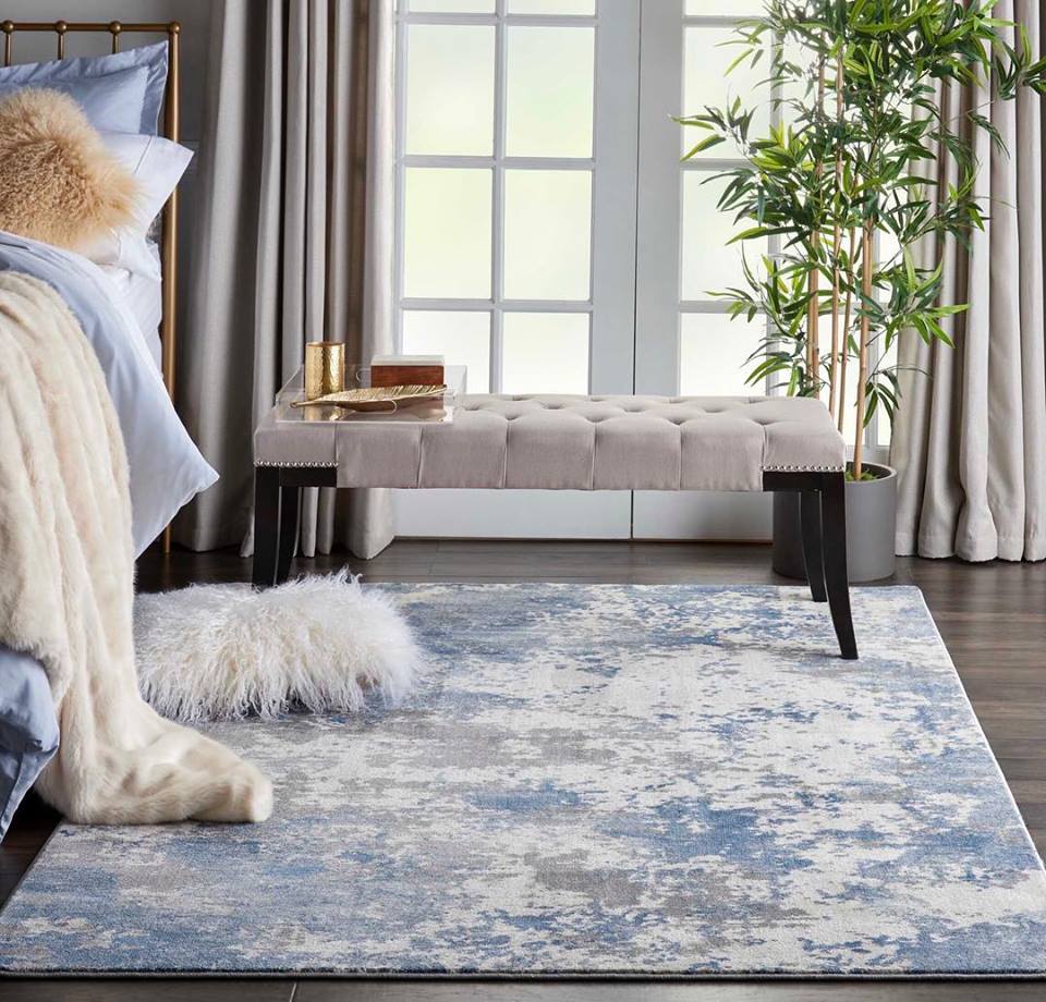 Understated White & Blue Abstract Area Rug