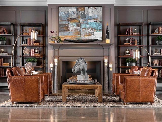 Ornate Living Room Featuring Bookcases and Hanging Lanterns