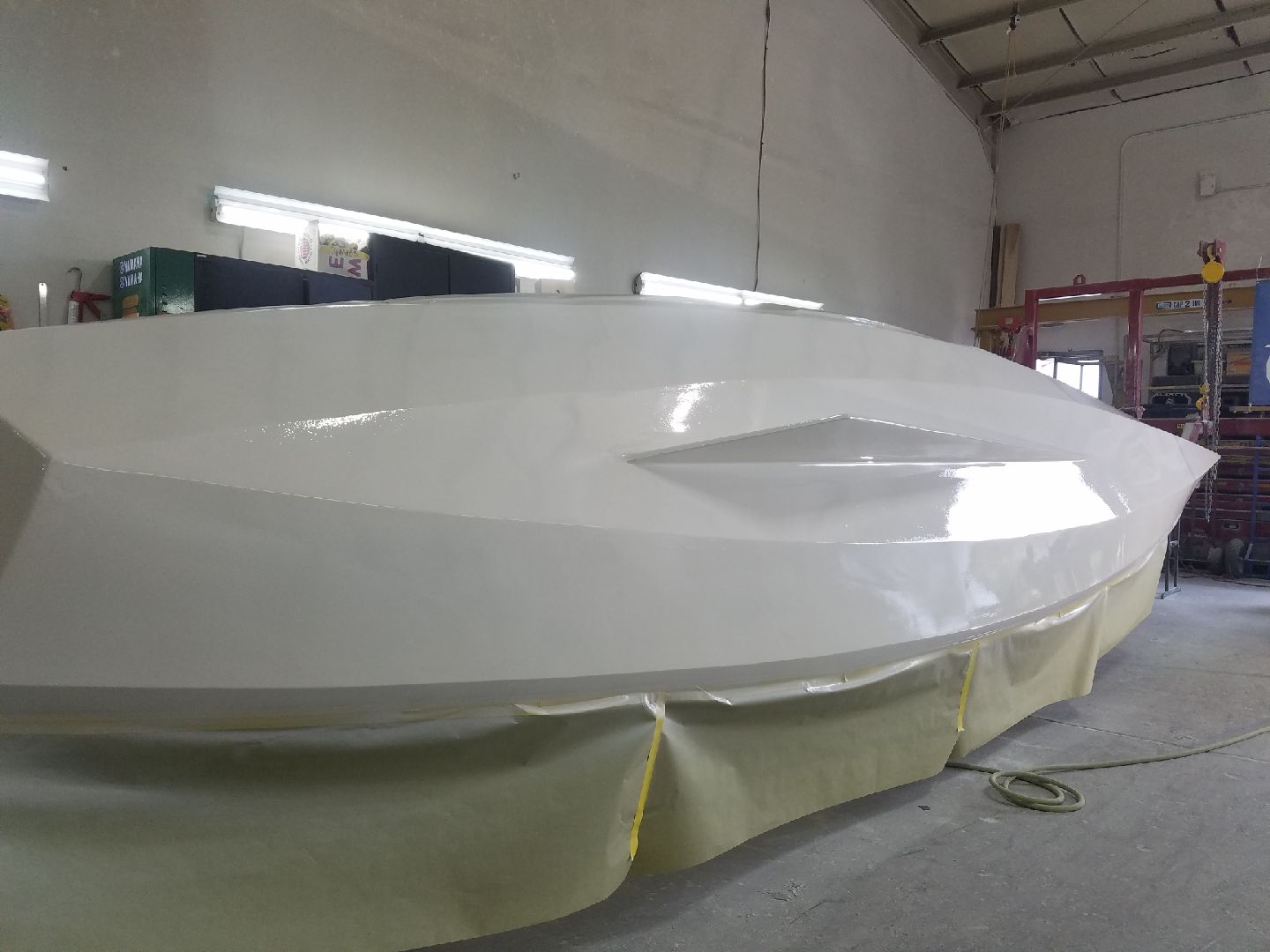 Bottom of Row4Kids boat is in refinishing stage