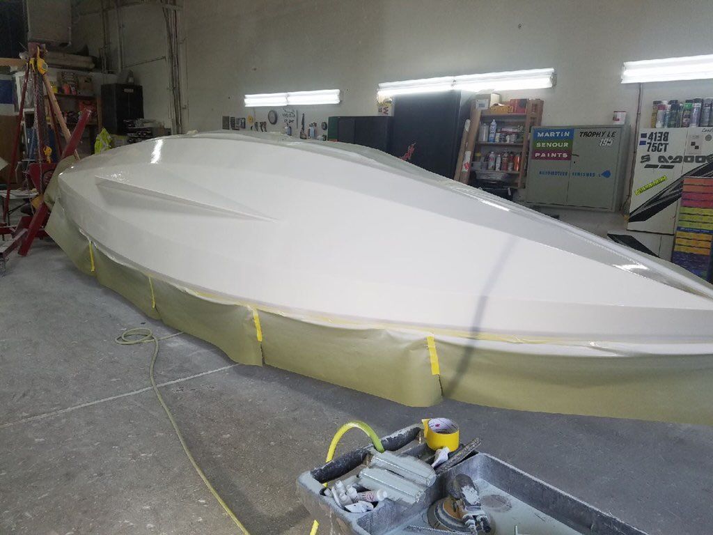 Bottom of Row4Kids boat is in refinishing stage