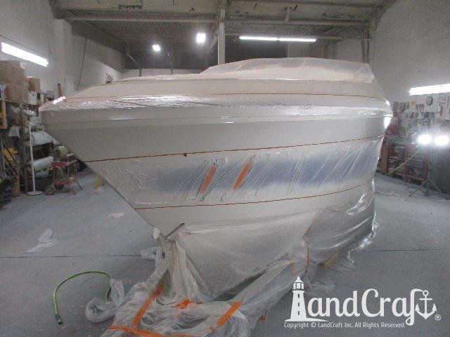 Wellcraft boat in process of exterior refinishing