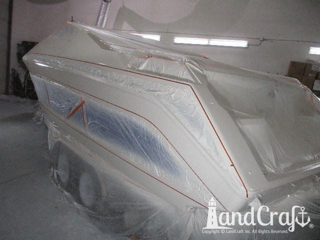 Wellcraft boat in process of exterior refinishing