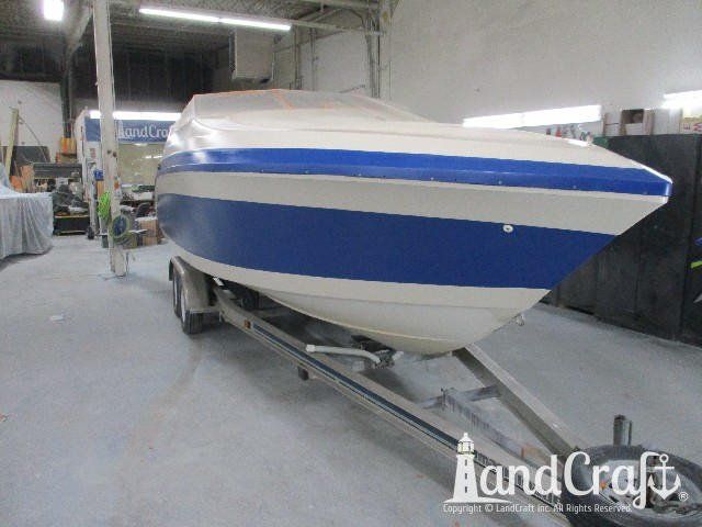 Wellcraft boat with completed exterior repairs and new exterior finish