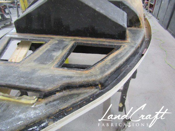 Spirit boat top cap in process of structural fiberglass repair
