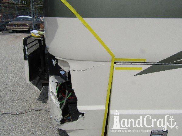 Country Coach motor coach with major rear end structural damage