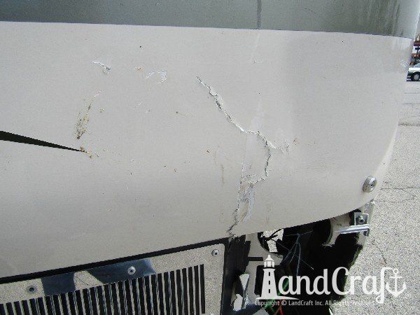 Country Coach motor coach with major front end structural damage