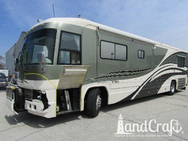 Country Coach motor coach with major front end structural damage