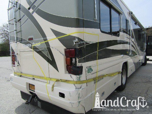 Country Coach motor coach with major rear end structural damage