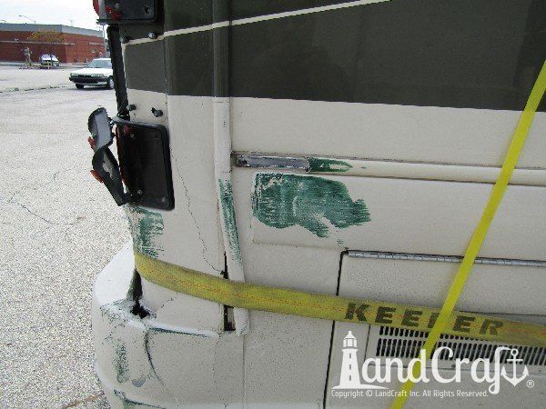 Country Coach motor coach with major rear end structural damage