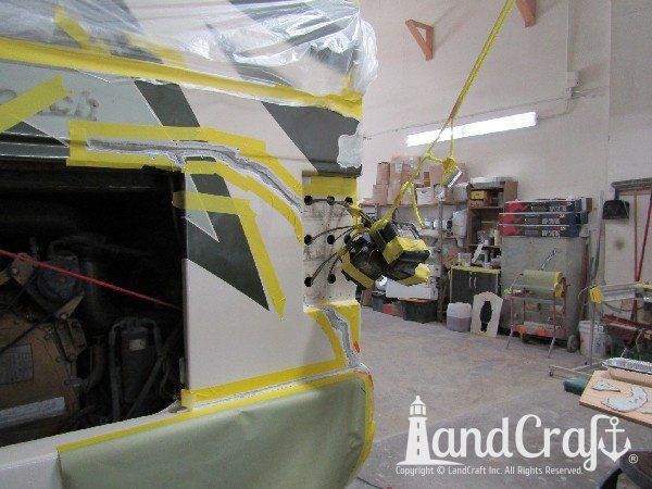 Country Coach motor coach with rear end fiberglass damage in the repair process