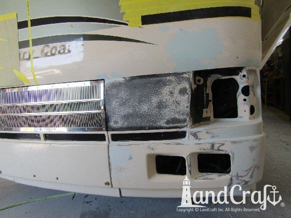Country Coach motor coach with front end fiberglass damage in the repair process